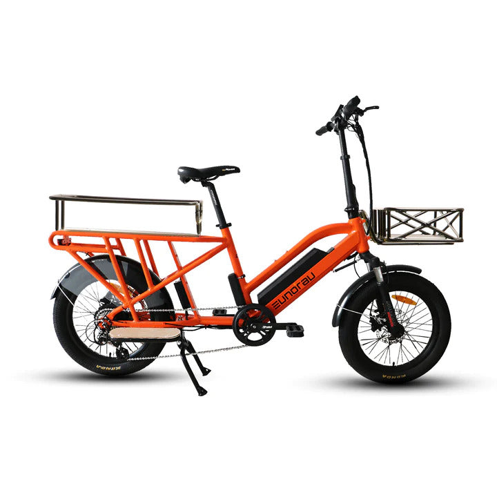Side profile of the Eunorau G30 Cargo Electric bike in orange. Longtail cargo ebike with foldable handlebars and standard rear seat footrests. Fitted with rear seat monkey bars and front cargo basket. White background.