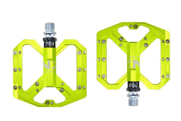 NEXT GEN ENZO flat foot mountain bike pedals in green colour. Top view.