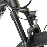 Close up of the front headlights of the Eunorau Specter S Electric Mountain bike against a blurred white background.