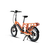 Rear angled profile of the Eunorau G30 Cargo Electric bike in orange. Longtail cargo ebike with foldable handlebars and standard rear seat footrests. White background.