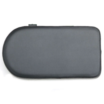 Overhead shot of the black cushion showing the rectangle shape with a curved rear section. Cushion is shot over a white background.