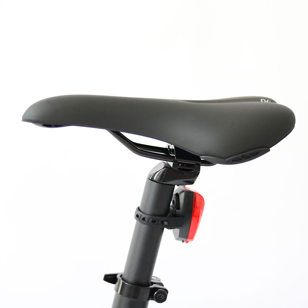 Close up of the Eunorau Specter ST electric mountain bike seat post with light attached to seat stem. White background.