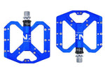 NEXT GEN ENZO flat foot mountain bike pedals in blue colour. Top view.